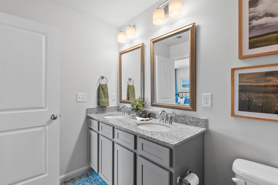 Representative furnished interior of a home built from the Palmetto II by McGuinn Homes in Clarke Townes, Anderson (Image 42).