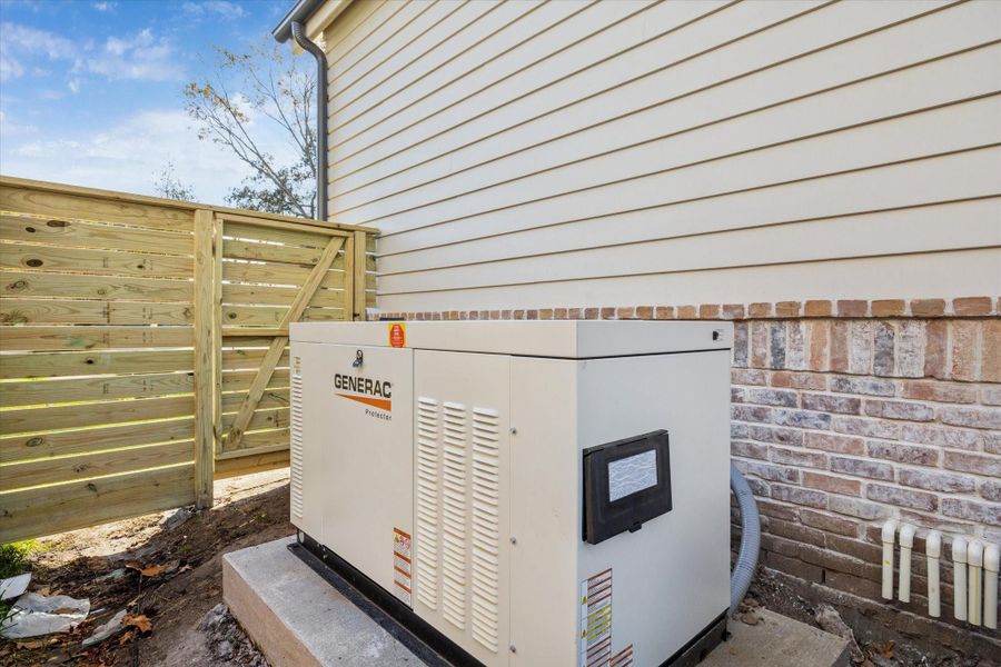 Exterior details and patio area of a home in , Spring Valley Village (Image 29).