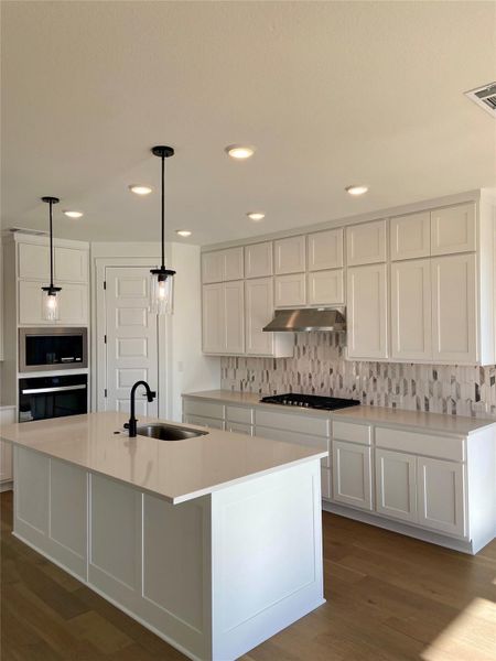 Furnished interior view inside a new home in Blackhawk in Pflugerville, Pflugerville (Image 10).