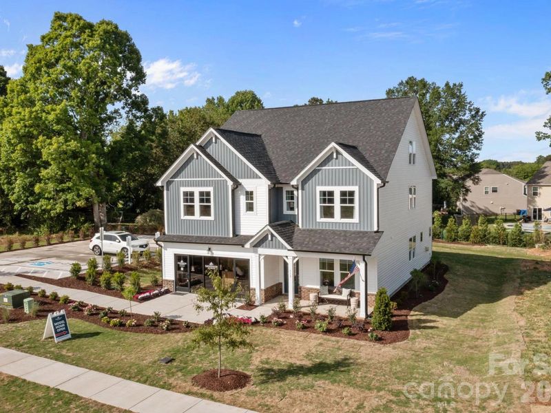 Front exterior of a new home in Windgate, Mooresville, NC, highlighting curb appeal (Image 2). Front exterior of a new home in Windgate, Mooresville, NC, highlighting curb appeal (Image 2).