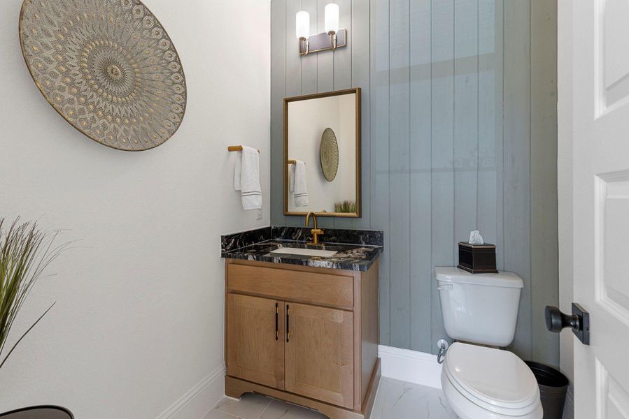 Elegant powder bath with designer finishes.