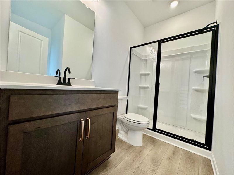Furnished interior view inside a new home in Eastlyn Crossing, Flowery Branch (Image 10).