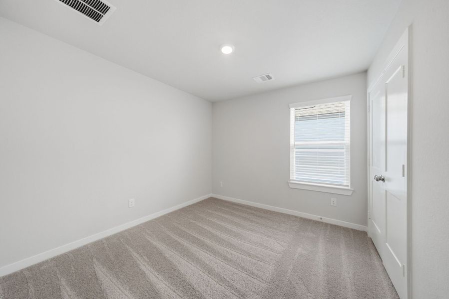 A room with white walls and a wood floor. A room with white walls and a wood floor.