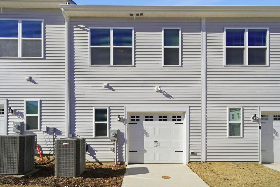 Exterior details and patio area of a home in Lakeview Village, Charlotte (Image 2). Exterior details and patio area of a home in Lakeview Village, Charlotte (Image 2).
