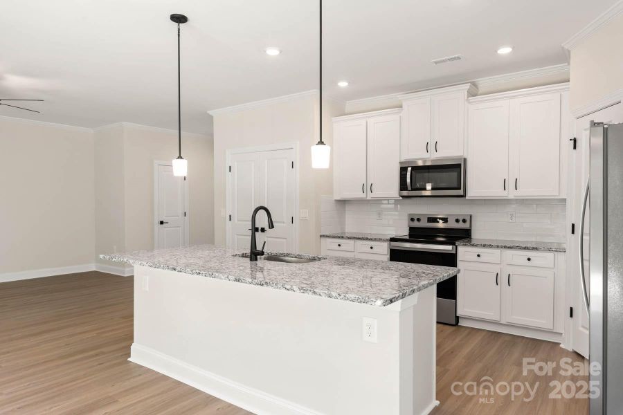 Furnished interior view inside a new home in Village at Granite, Salisbury (Image 9). Furnished interior view inside a new home in Village at Granite, Salisbury (Image 9).