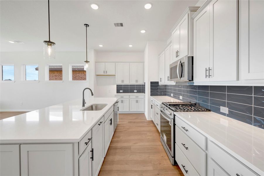 Furnished interior view inside a new home in The Grand Prairie 50’, Hockley (Image 5).