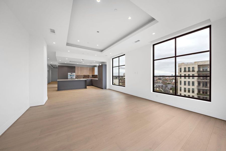 Perfect for entertaining, this versatile space features open sightlines from the living to the kitchen. Perfect for entertaining, this versatile space features open sightlines from the living to the kitchen.