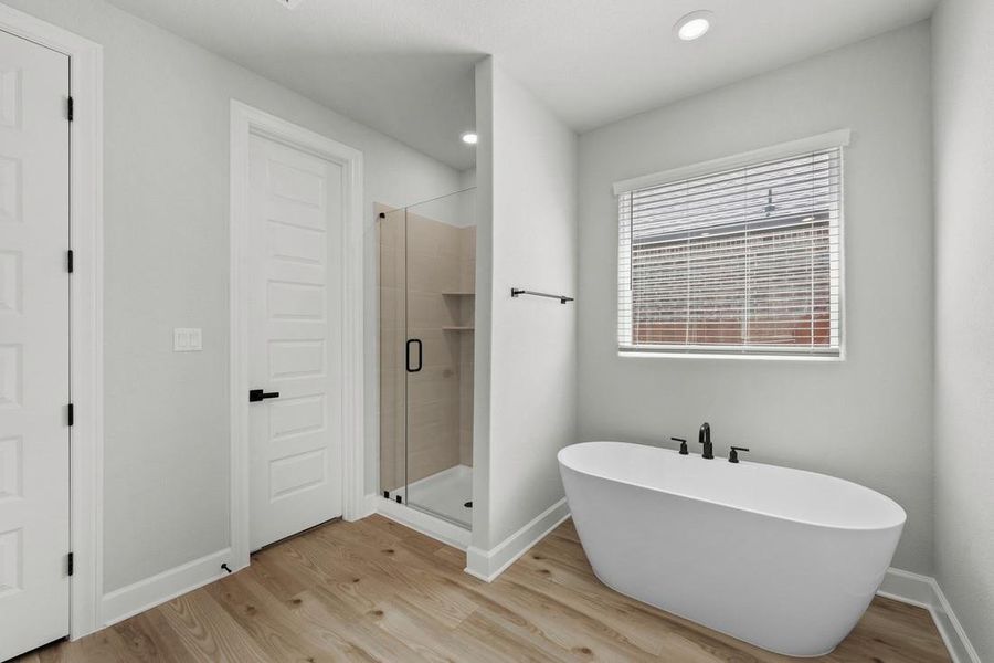 Relax in the large soaking tub or enjoy the spacious, standing shower.