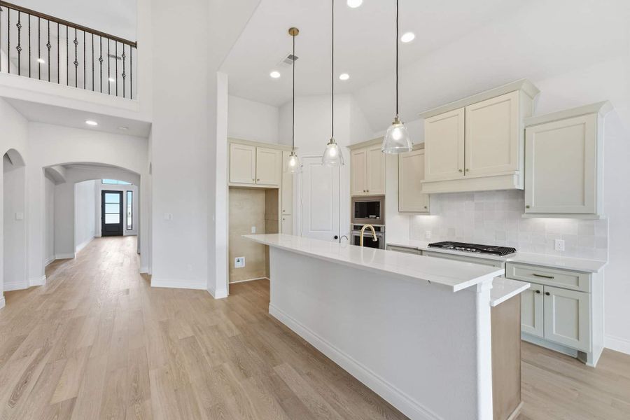 Furnished interior view inside a new home in Bridgeland 50′, Cypress (Image 6).