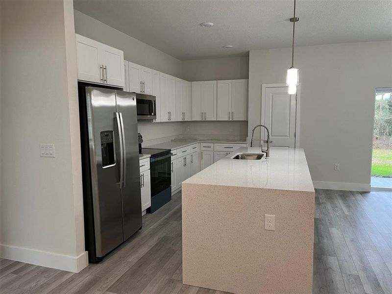 Furnished interior view inside a new home in , Dunnellon (Image 4).