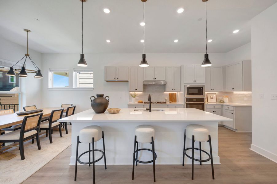 Furnished interior view inside a new home in Double Creek Crossing, Round Rock (Image 6).