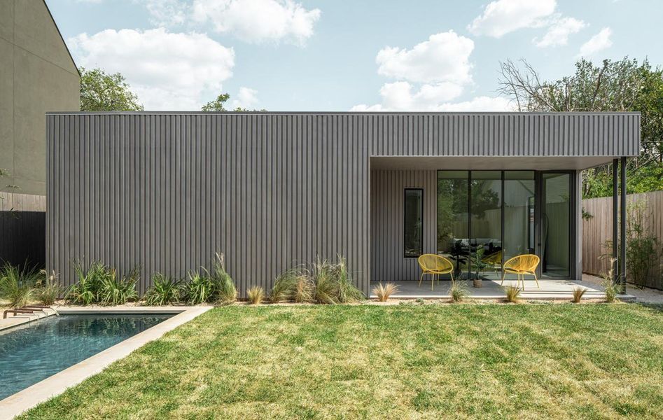 Back of house with a patio area