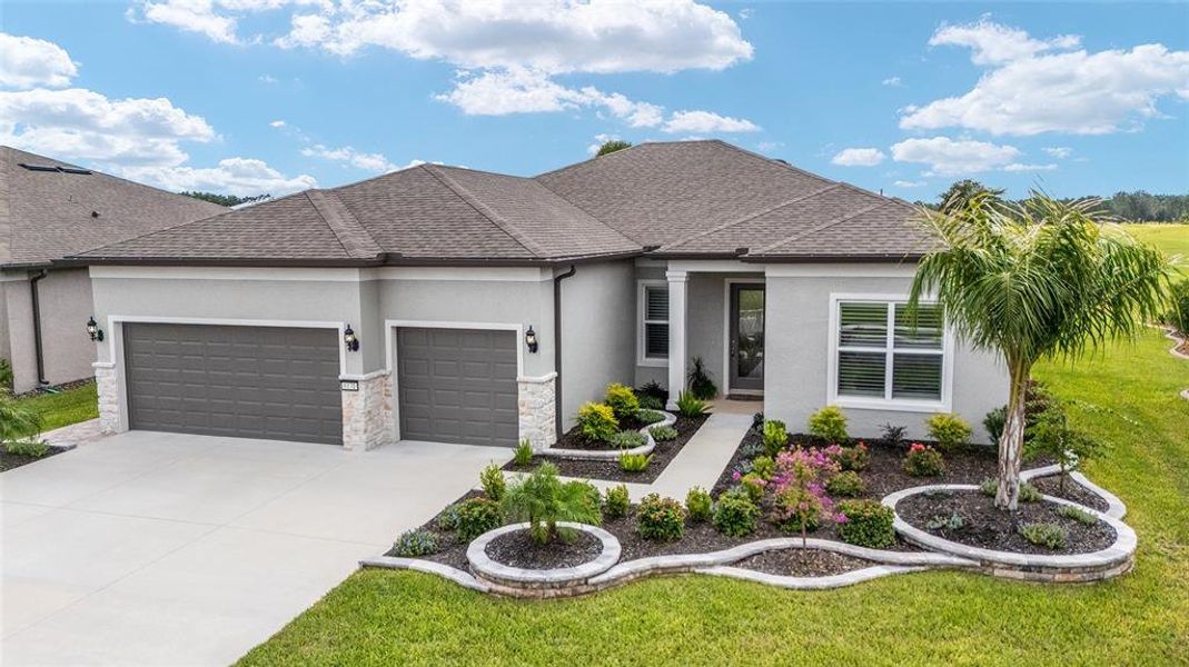 Front exterior of a new home in , Ocala, FL, highlighting curb appeal (Image 27).