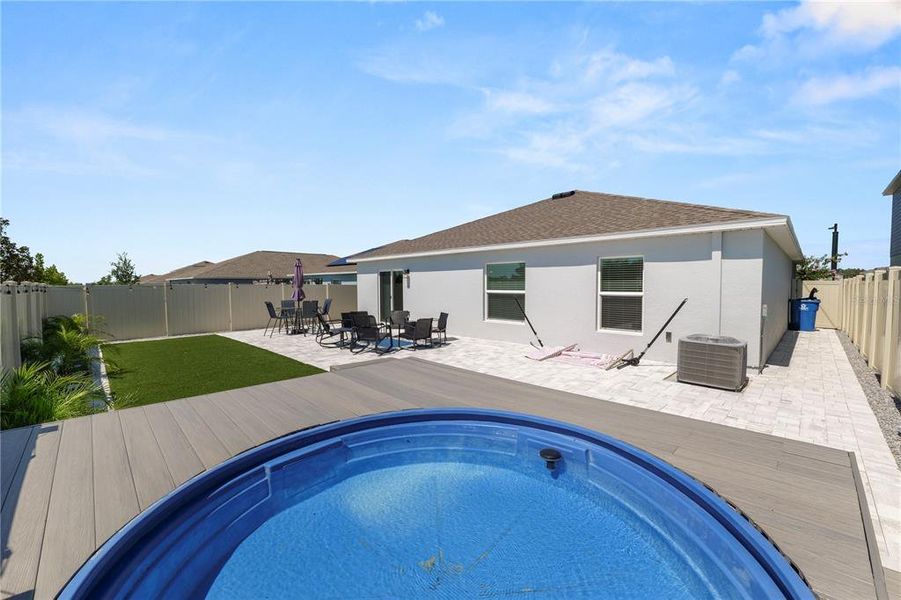 Exterior details and patio area of a home in Hunt Club Groves, Lake Wales (Image 32).