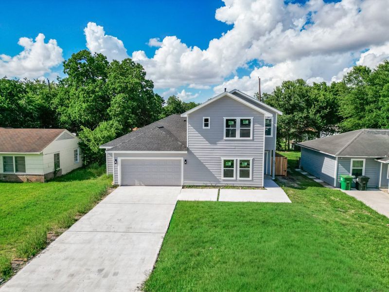 Front exterior of a new home in , Houston, TX, highlighting curb appeal (Image 21).