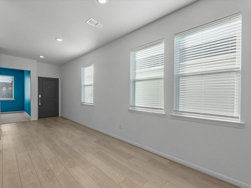 A wall of windows brightens your entry