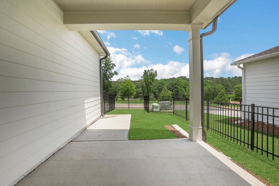 Exterior details and patio area of a home in Marble Tree, Ball Ground (Image 3).
