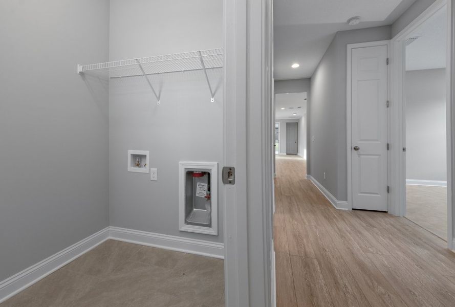 Representative unfurnished interior of a home built from the Boca by Riverside Homes in Mariposa at EverRange, Jacksonville (Image 35).