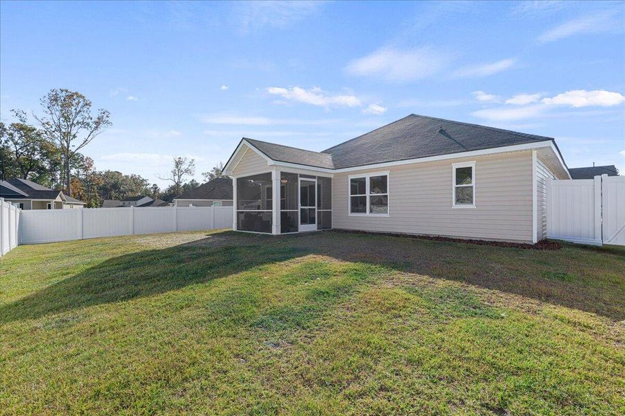 Exterior details and patio area of a home in , Bluffton (Image 21).