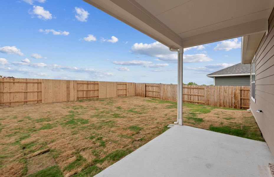 Exterior details and patio area of a home in Patterson Ranch, Georgetown (Image 22).