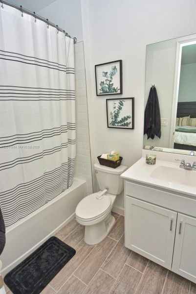 Furnished interior view inside a new home in Central Park, Port St. Lucie (Image 35).