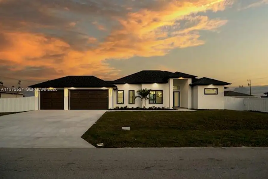 Front exterior of a new home in , Cape Coral, FL, highlighting curb appeal (Image 16).