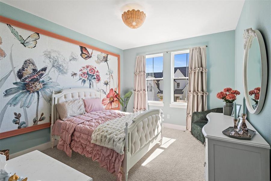 Bedroom featuring carpet floors and baseboards Bedroom featuring carpet floors and baseboards