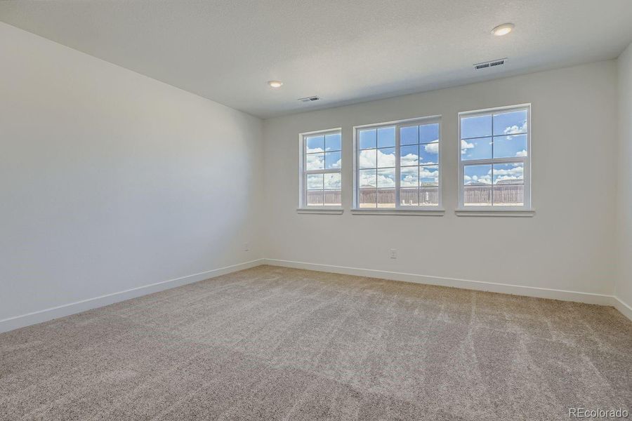 Spacious, unfurnished interior of a new home in Newlin Crossing: The Monarch Collection, Parker (Image 9). Spacious, unfurnished interior of a new home in Newlin Crossing: The Monarch Collection, Parker (Image 9).