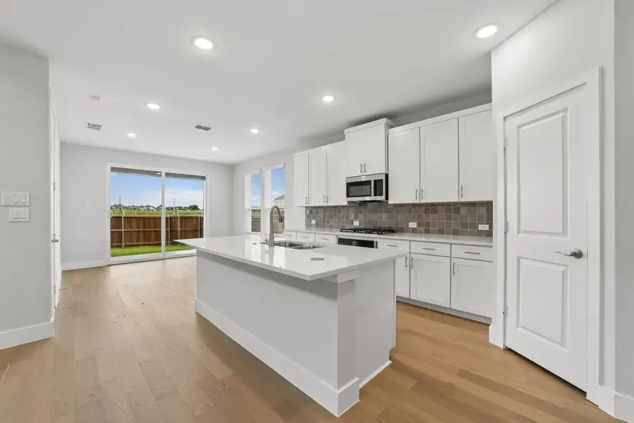 Representative furnished interior of a home built from the Harwood by Landon Homes in Lexington Frisco, Frisco (Image 7).