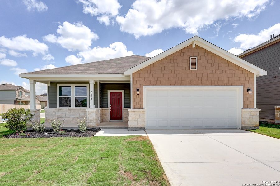 Front exterior of a new home in Cinco Lakes, San Antonio, TX, highlighting curb appeal (Image 20).