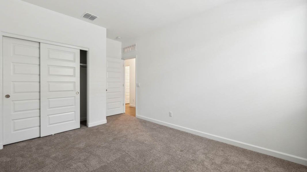 Spacious, unfurnished interior of a new home in Magma Ranch Vistas, Florence (Image 25).