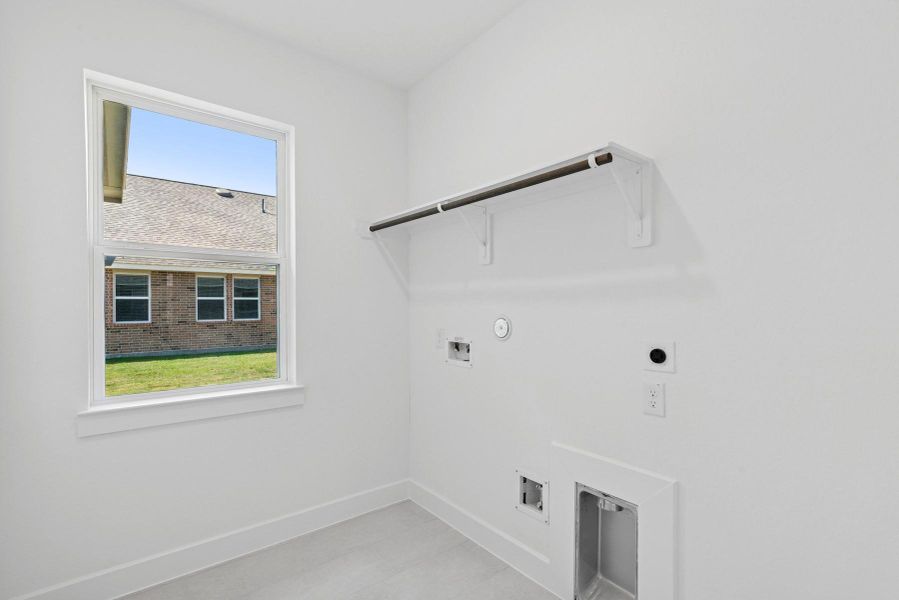 Laundry room (*Photo not of actual home and used for illustration purposes only.)