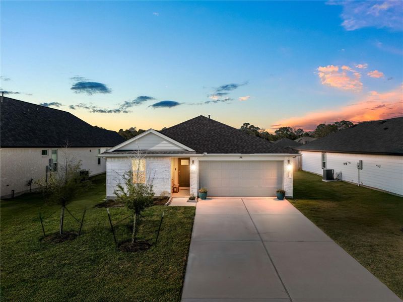 Front exterior of a new home in , Cypress, TX, highlighting curb appeal (Image 18).