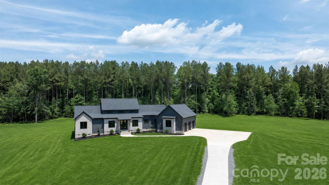 Front exterior of a new home in , Rock Hill, SC, highlighting curb appeal (Image 31).