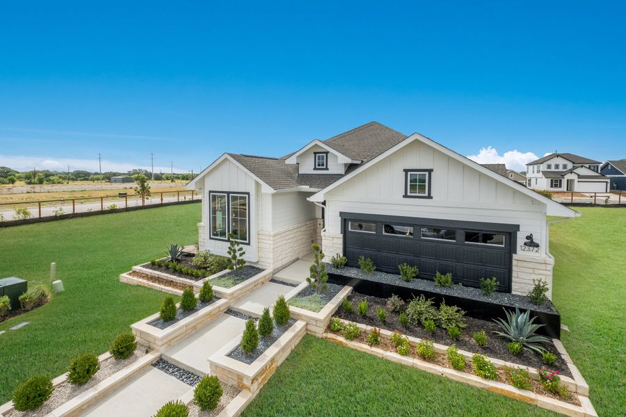 Representative exterior photo of a completed home built from the Elgin by Scott Felder Homes in Prominence, San Antonio, TX (Image 26). Representative exterior photo of a completed home built from the Elgin by Scott Felder Homes in Prominence, San Antonio, TX (Image 26).