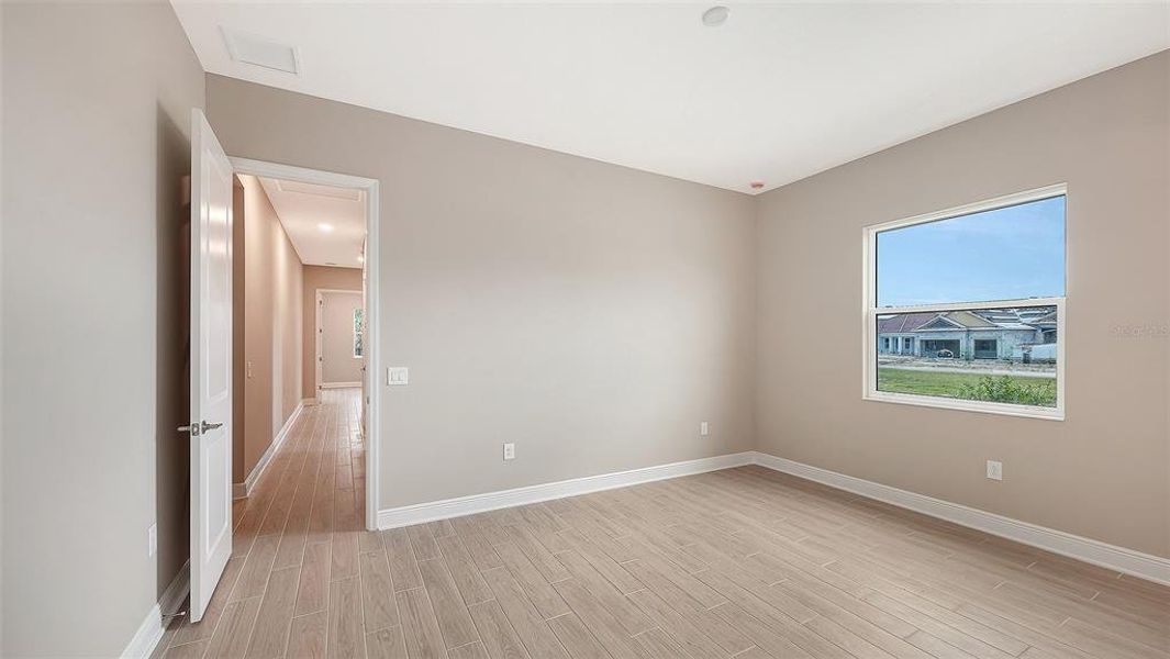 Spacious, unfurnished interior of a new home in Grand Park, Sarasota (Image 33). Spacious, unfurnished interior of a new home in Grand Park, Sarasota (Image 33).