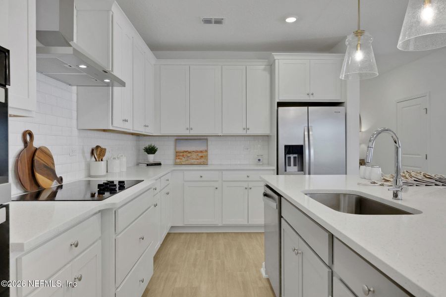 Furnished interior view inside a new home in Seminole Trace, Palm Coast (Image 52).