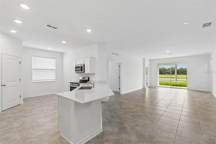 Furnished interior view inside a new home in Peace Creek Reserve, Winter Haven (Image 16).