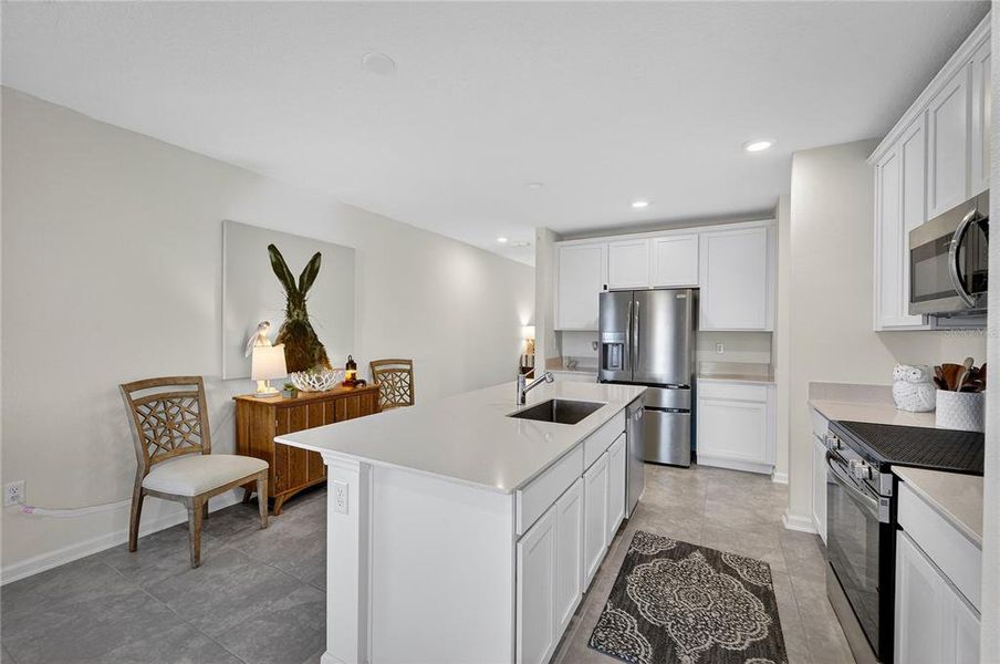 Furnished interior view inside a new home in Preserve at LPGA: Manor Collection, Daytona Beach (Image 10).