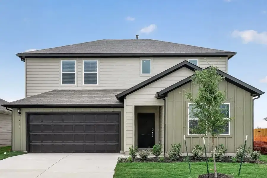 Representative exterior photo of a completed home built from the Sparrow by Taylor Morrison in Longview, Del Valle, TX (Image 21).