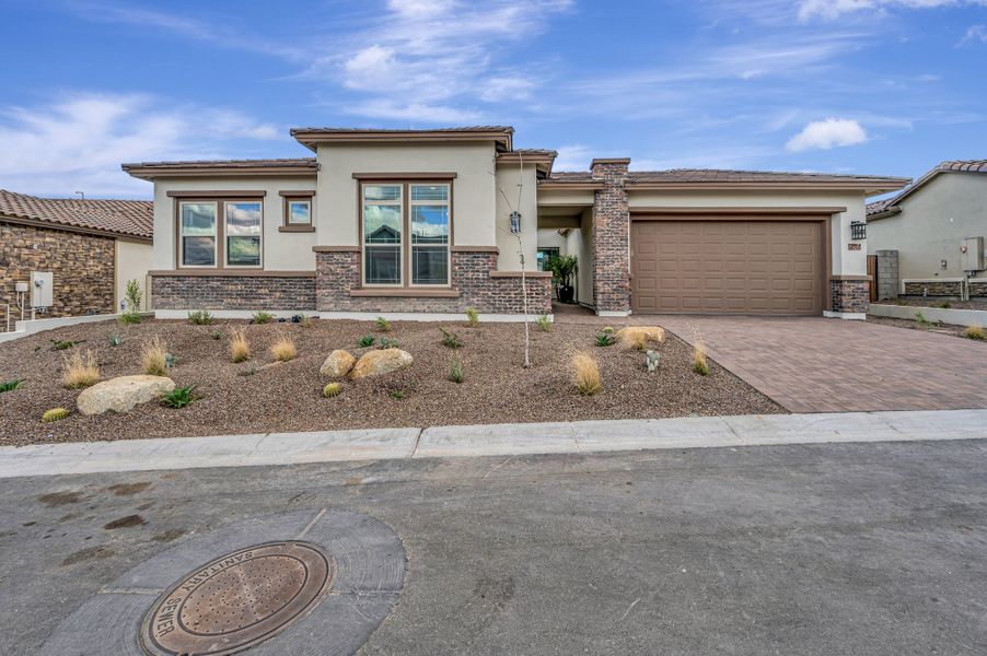 Front exterior of a new home in The Ridge at Victory, Buckeye, AZ, highlighting curb appeal (Image 23).