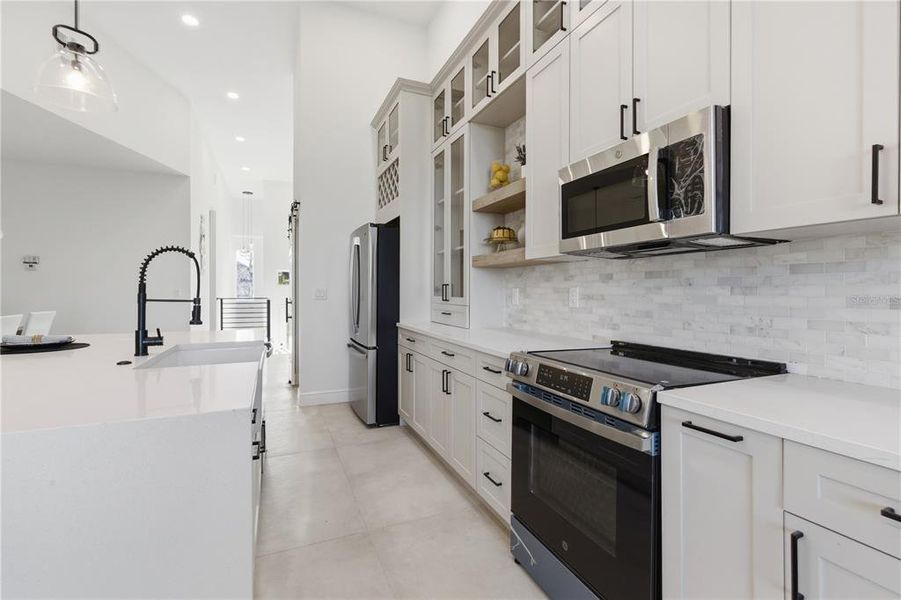 Furnished interior view inside a new home in , New Port Richey (Image 42).