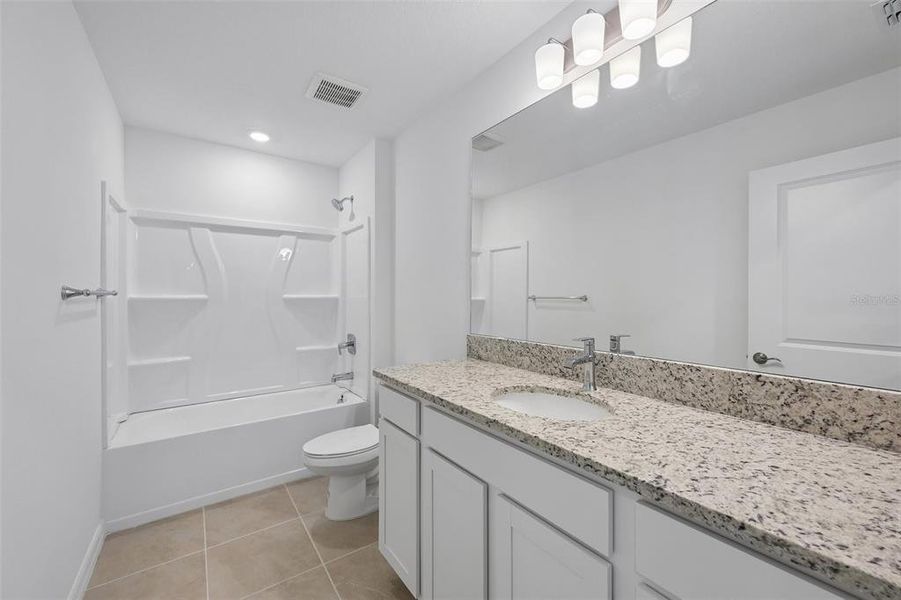 Furnished interior view inside a new home in Southpointe, Palmetto (Image 8). Furnished interior view inside a new home in Southpointe, Palmetto (Image 8).