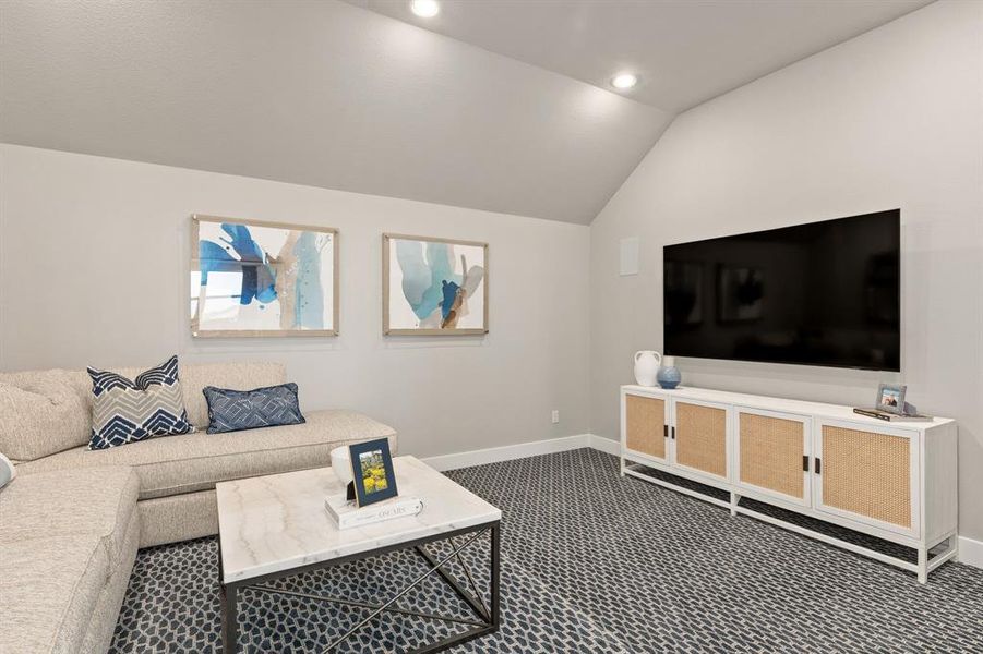 Living room featuring vaulted ceiling, dark carpet, and recessed lighting Living room featuring vaulted ceiling, dark carpet, and recessed lighting