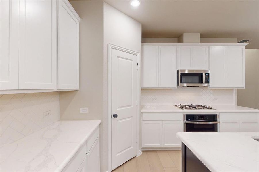 Furnished interior view inside a new home in Lilybrooke at Legacy Hills, Celina (Image 11). Furnished interior view inside a new home in Lilybrooke at Legacy Hills, Celina (Image 11).