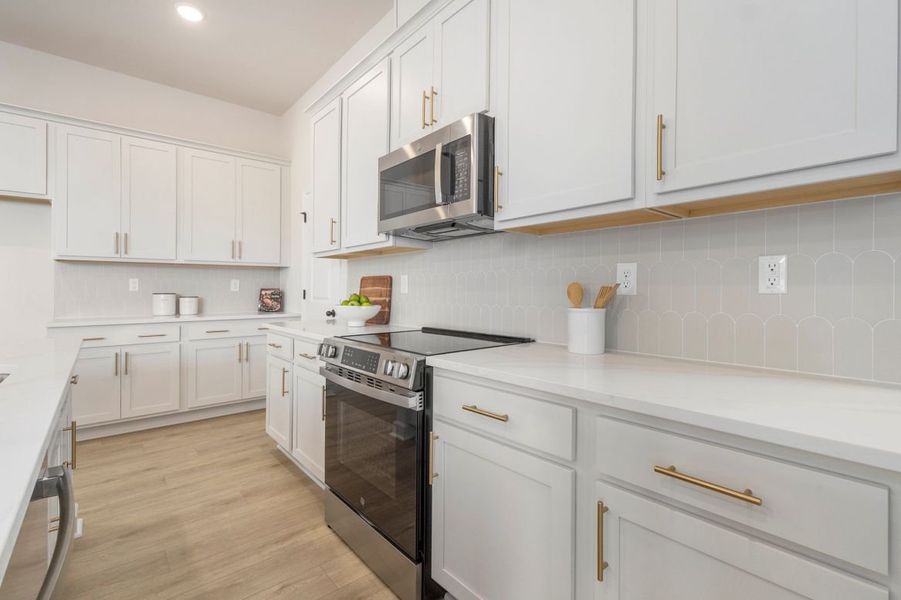 Representative furnished interior of a home built from the Zion - Waterway by Ashton Woods in Blue Heron Retreat, Little River (Image 11).