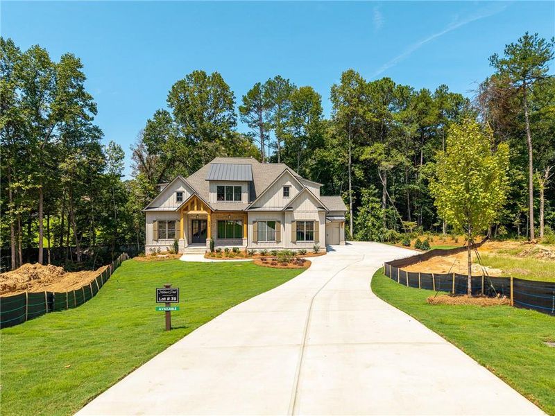 Front exterior of a new home in Malone's Pond, Ball Ground, GA, highlighting curb appeal (Image 27).