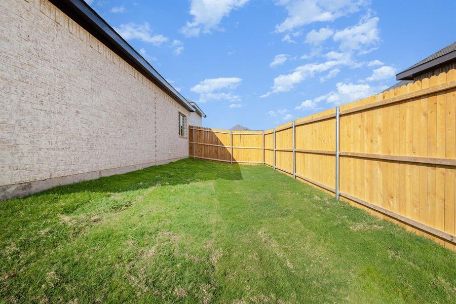 Exterior details and patio area of a home in Ten Mile Creek Estates, DeSoto (Image 24).