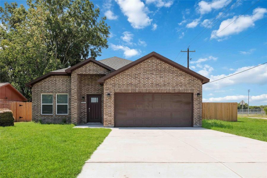Front exterior of a new home in , Texas City, TX, highlighting curb appeal (Image 1). Front exterior of a new home in , Texas City, TX, highlighting curb appeal (Image 1).