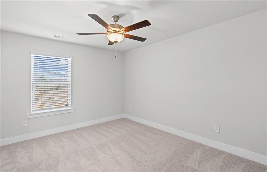 Spacious, unfurnished interior of a new home in Creekside at Skelton, Jefferson (Image 28).